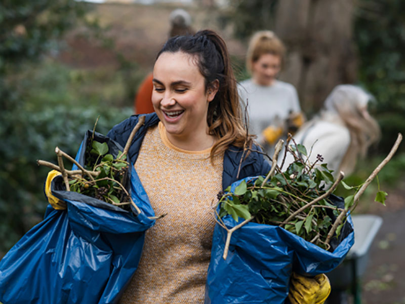 Volunteer gardener smiling